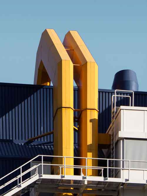 brown and white mountains under white clouds and blue sky during daytime